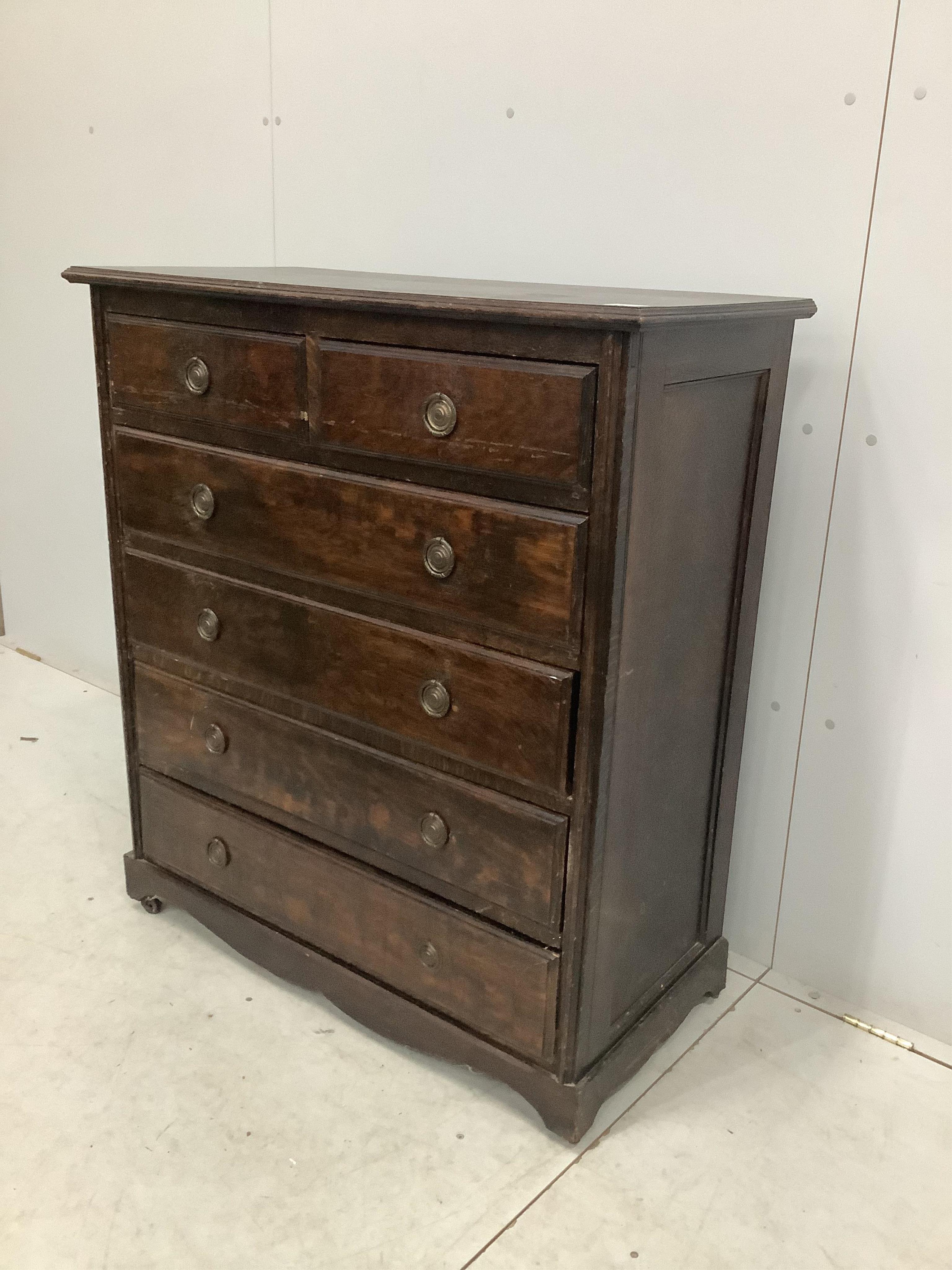 An early 20th century oak chest of drawers, width 96cm, depth 47cm, height 108cm. Condition - fair